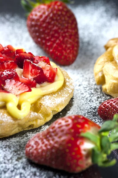 Zeppole with strawberry- tipical italian pastry — Stock Photo, Image