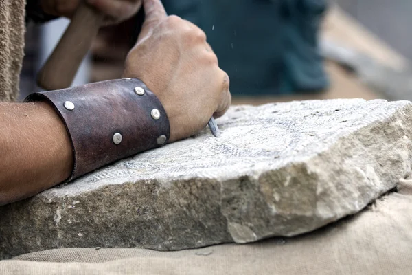 Stone carving - reconstruction of medieval stone work — Stock Photo, Image