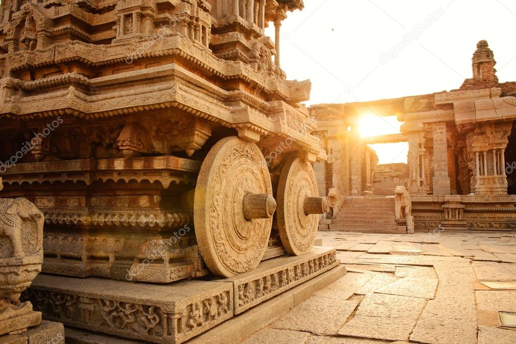 Stone chariot in Hampi Vittala Temple at sunset