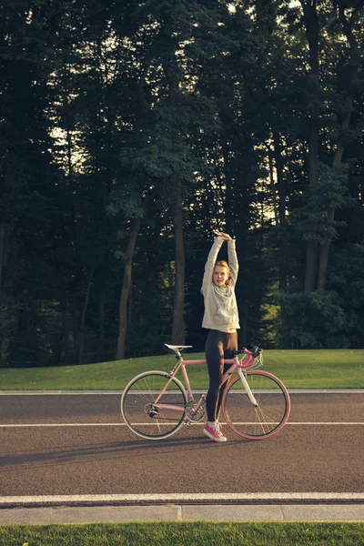 Active woman on bicycle — Stock Photo, Image