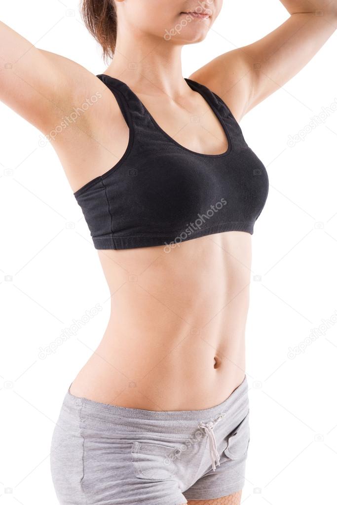 Young sport woman with perfect fitness body 