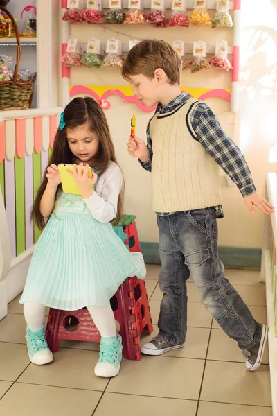 Little boy watching how girl playing tablet — Stock Photo, Image