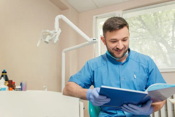 Portrait of young dentist in the dental office — Stock Photo, Image