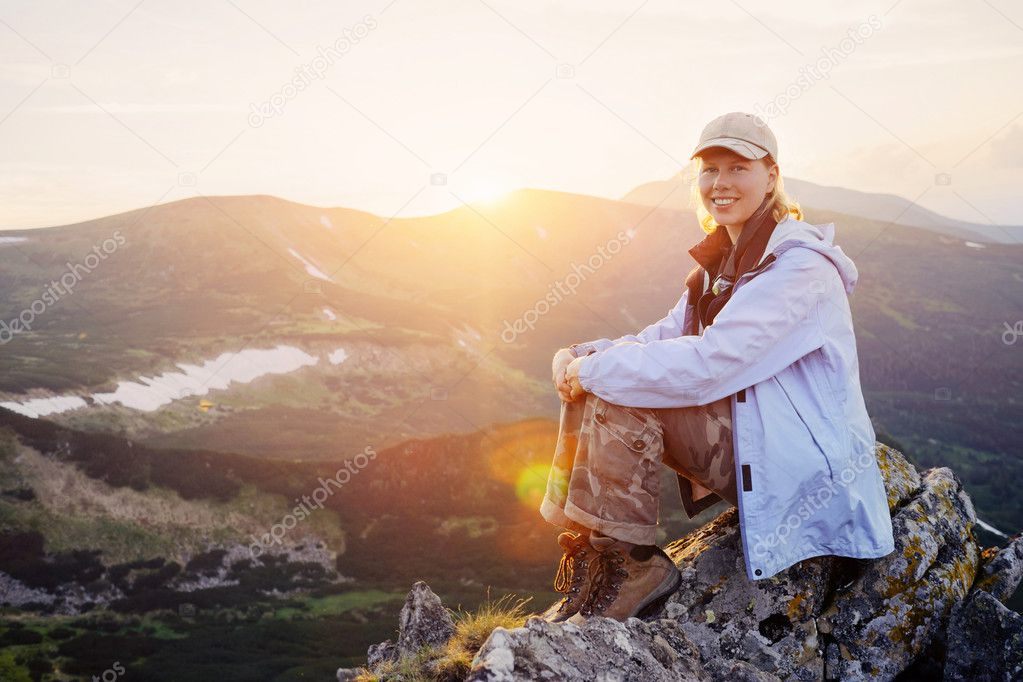 Woman enjoy the beautiful view in the mountains