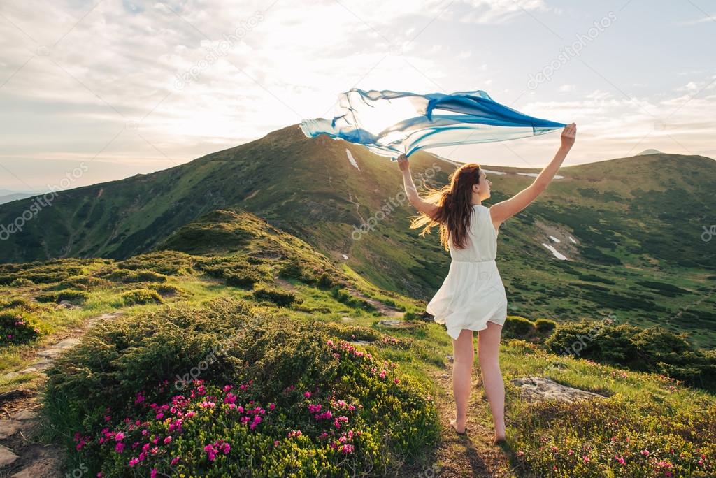 Woman feel freedom and enjoying the nature