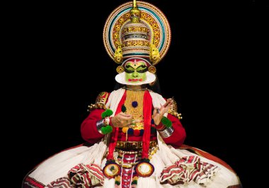 Kathakali actor during performance clipart