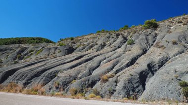 View of a rill network with deep erosions on a hillslope close to Nafpaktos, Greece clipart