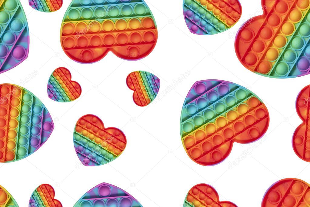 Seamless pattern pop it toy. Heart seamless pattern. Rainbow color seamless pattern.