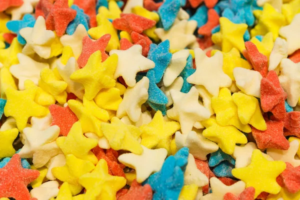 Multicolored gummy candies in form of stars. Bright candy