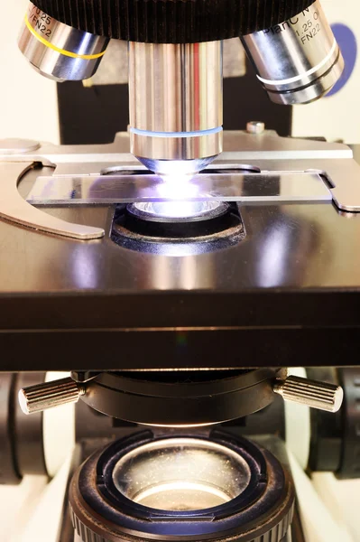 Close up shot of microscope at the blood laboratory — Stock Photo, Image