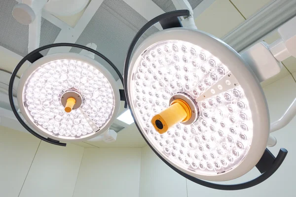 Two surgical lamps in operation room — Stock Photo, Image