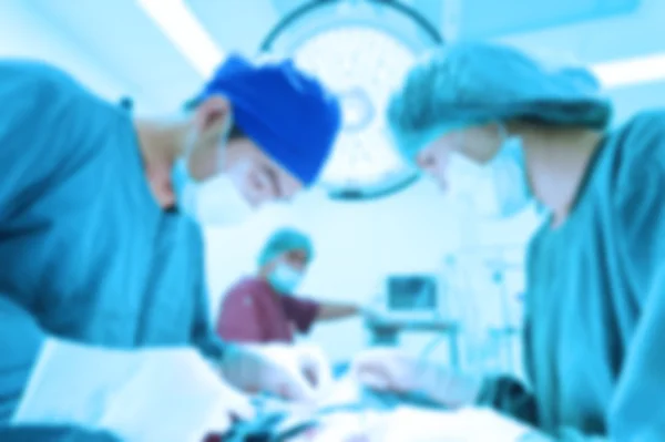 Blur of group of veterinarian surgery in operation room — Stock Photo, Image