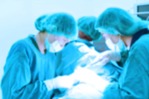 Blur of group of veterinarian surgery in operation room — Stock Photo, Image