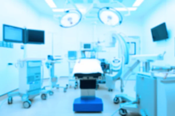 Desenfoque de equipos y dispositivos médicos en quirófano moderno — Foto de Stock
