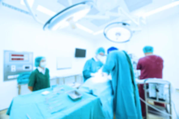 Desenfoque del grupo de cirugía veterinaria en la sala de operaciones — Foto de Stock