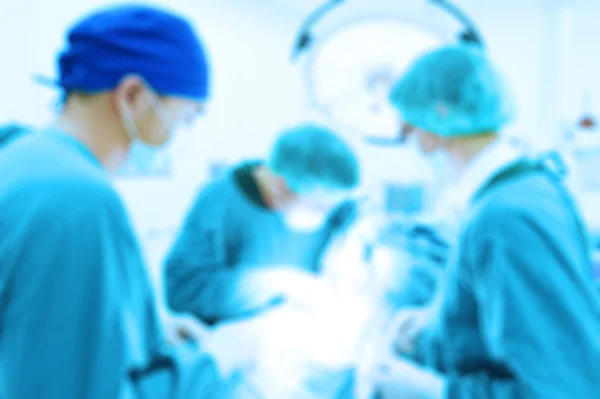 Blur of group of veterinarian surgery in operation room — Stock Photo, Image