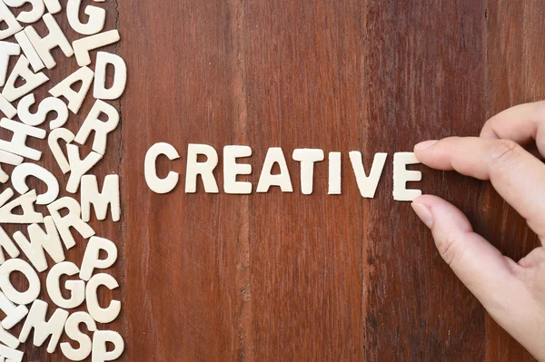 Word creative made with block wooden letters — Stock Photo, Image
