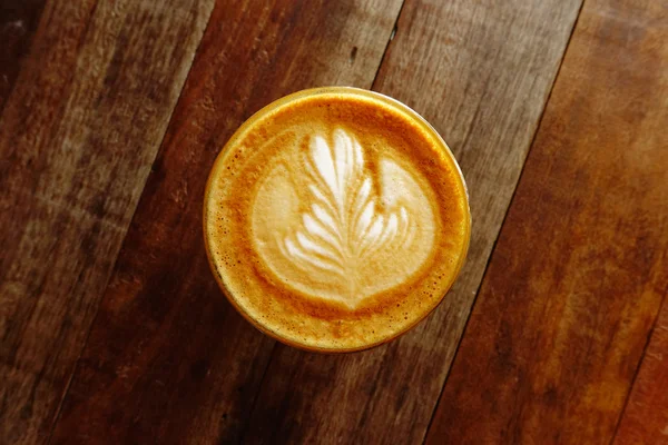 Cup of latte art coffee — Stock Photo, Image