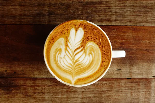 Šálek kávy latte art — Stock fotografie