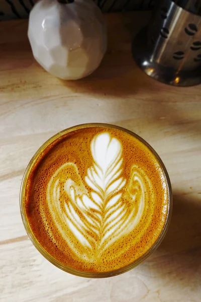 Cup of latte art coffee — Stock Photo, Image