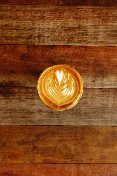 Cup of latte art coffee — Stock Photo, Image