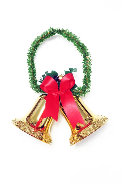 Golden bells with a red bow for background — Stock Photo, Image