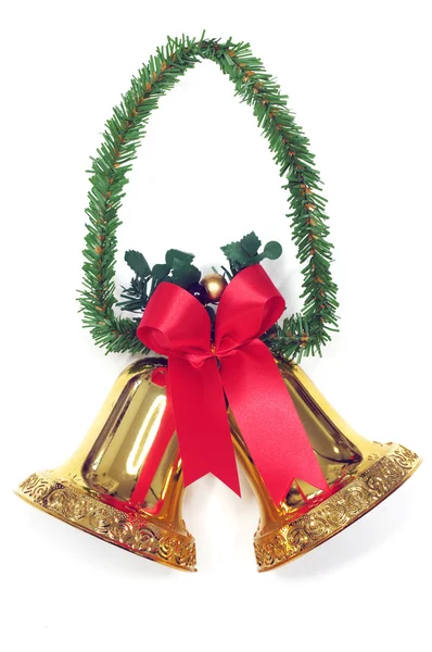 Golden bells with a red bow for background — Stock Photo, Image