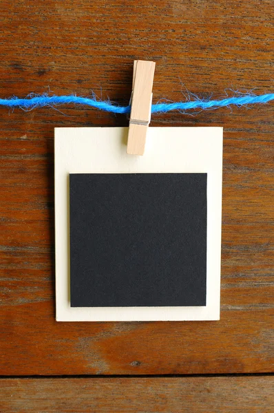 Blank photo frames on blue line — Stock Photo, Image