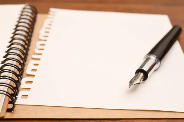 Open notebook and pen — Stock Photo, Image