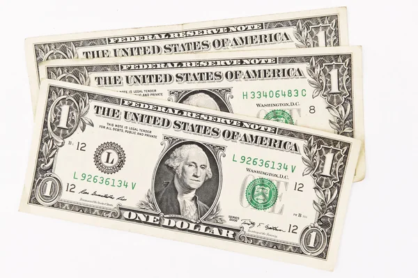 Um dólar isolado no fundo branco . — Fotografia de Stock