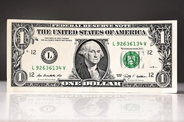 One dollar on black background — Stock Photo, Image
