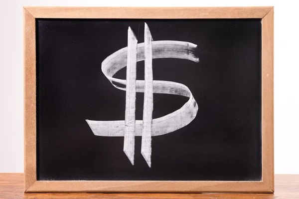 Dollar sign on a blackboard — Stock Photo, Image