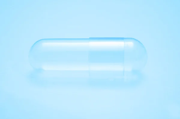 Empty capsules for background — Stock Photo, Image