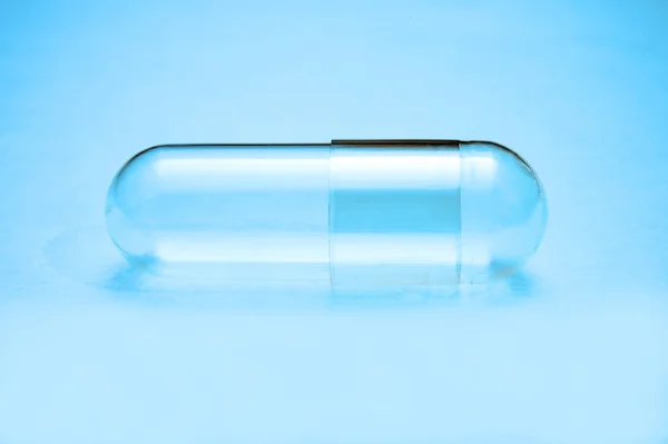 Empty capsules for background — Stock Photo, Image