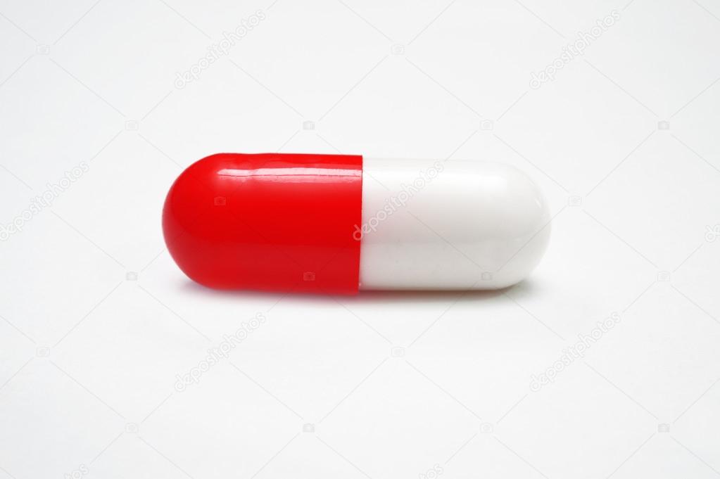 Capsule pills. White and red pills