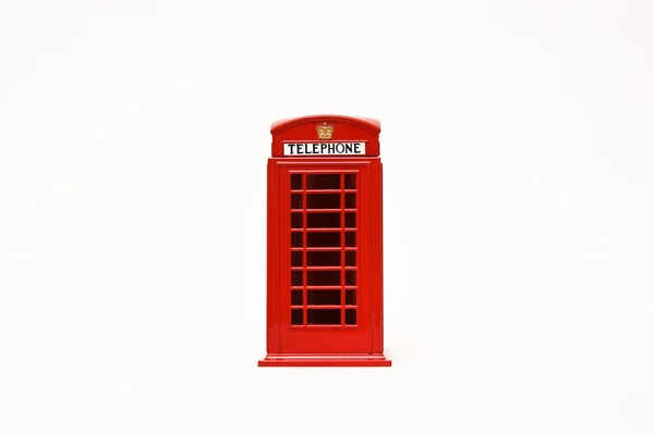 Cabine de telefone vermelho isolado no fundo branco — Fotografia de Stock