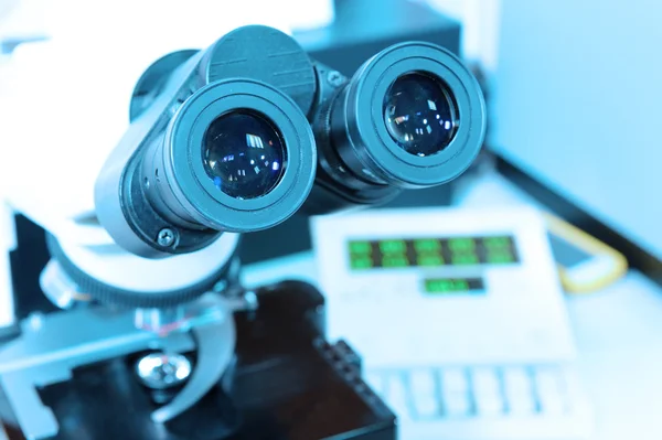 Close up shot of microscope at the blood laboratory — Stock Photo, Image