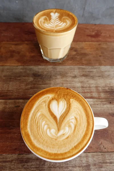 Cup of latte art coffee — Stock Photo, Image