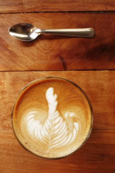 Cup of latte art coffee — Stock Photo, Image