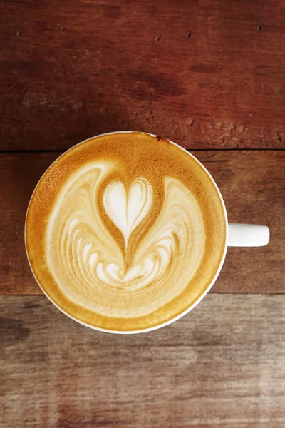 Cup of latte art coffee — Stock Photo, Image