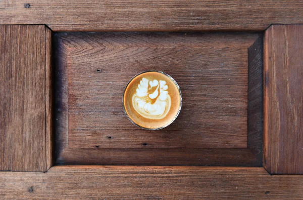 Cup of latte art coffee — Stock Photo, Image