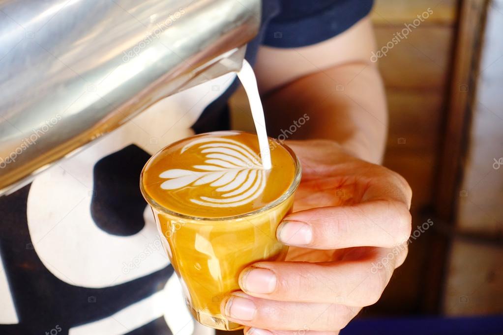 a cup of latte art coffee