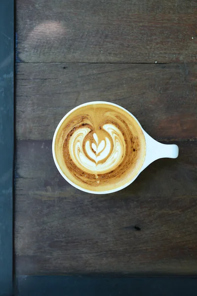 Šálek kávy latte art — Stock fotografie