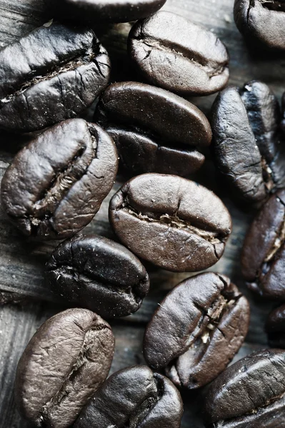 Detailní záběr kávová zrna pozadí — Stock fotografie