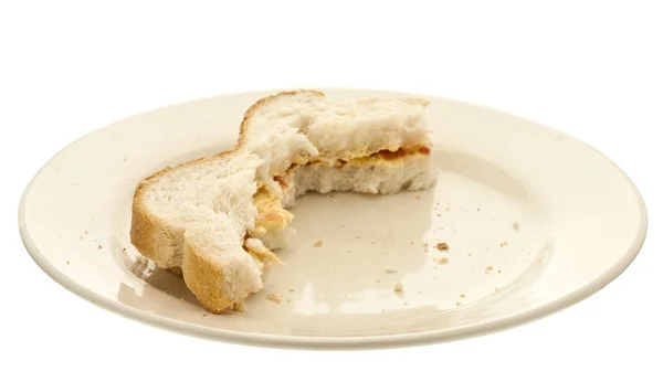 Половина сендвіч на тарілці Стокове Фото