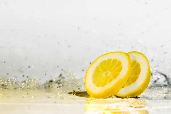 Lemon water drops Royalty Free Stock Photos