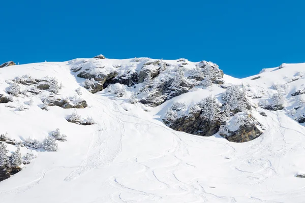 Ski snowboard and avalanches tracks. — Stock Photo, Image