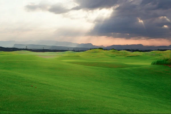 Golf course in the rays light — Stock Photo, Image