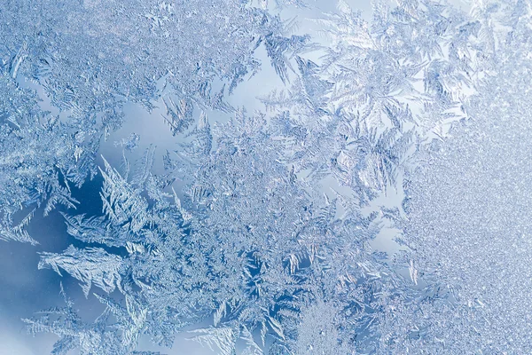 Frost patterns on window — Stock Photo, Image