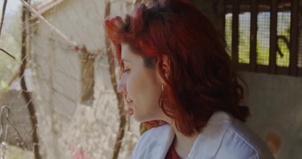 Young Female Agronomist Working Summer Garden Redhead Woman Checking Plants — Stock Video